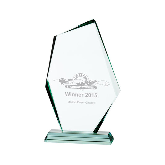 Clear glass award with engraved text on a white background