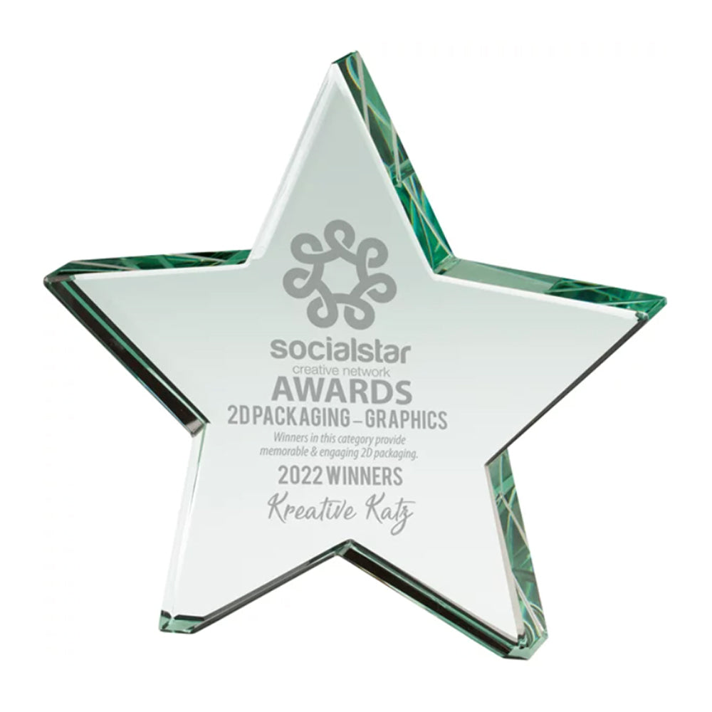 Star-shaped glass award with engraved text on a white background