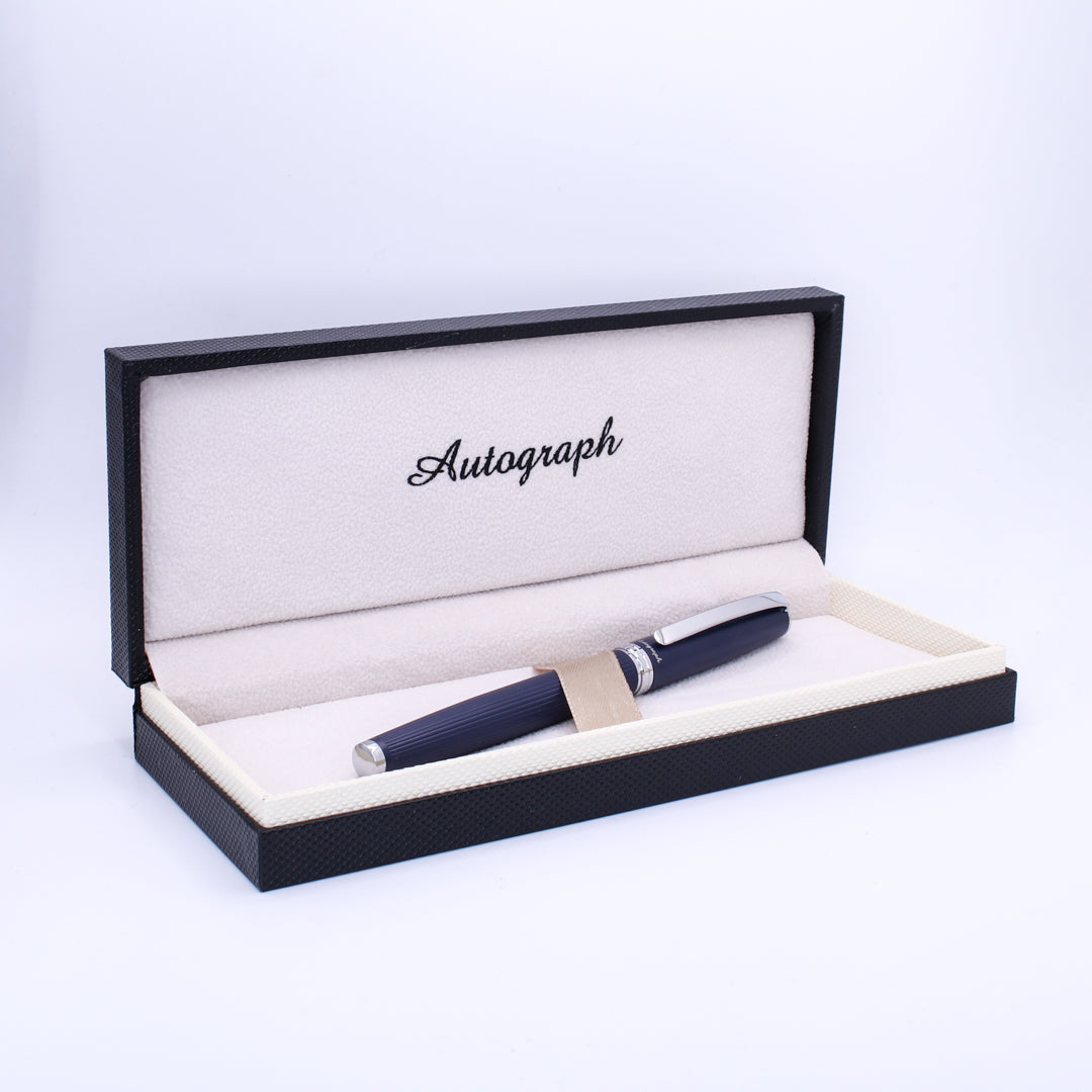 Fountain pen in an open 'Autograph' branded box on a white background