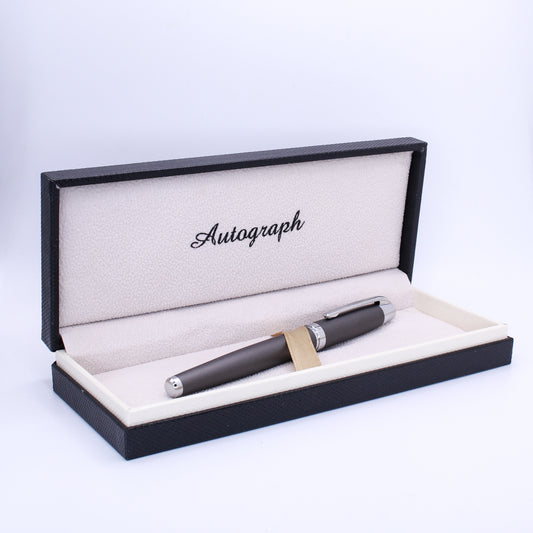 Fountain pen in a 'Autograph' branded box on a white background
