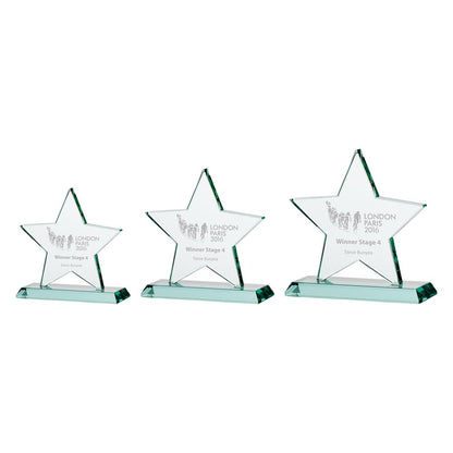 Three star-shaped glass awards on a white background