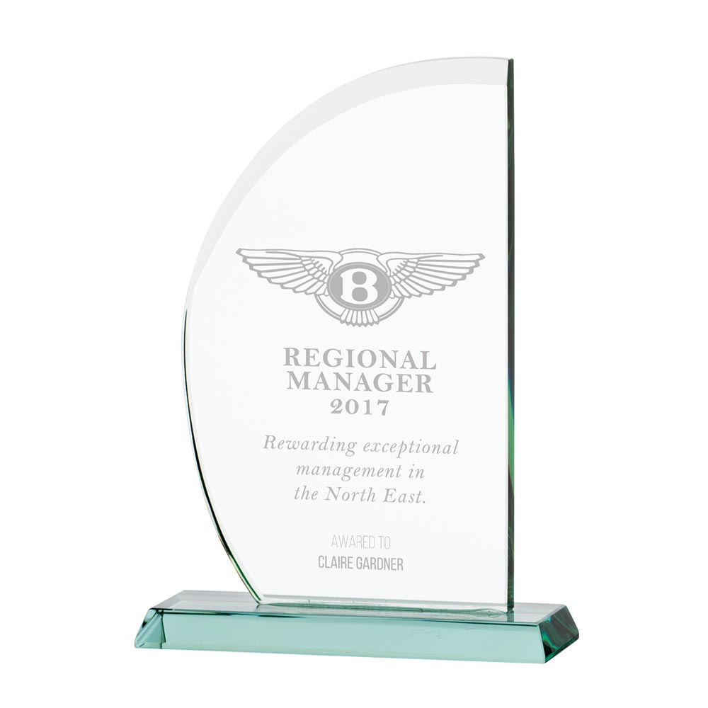 Glass award with Bentley logo and text on a white background