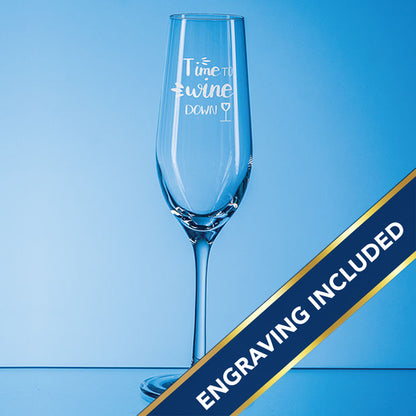 Clear wine glass with 'Time to Swine Down' text on a blue background and an engraving included banner.