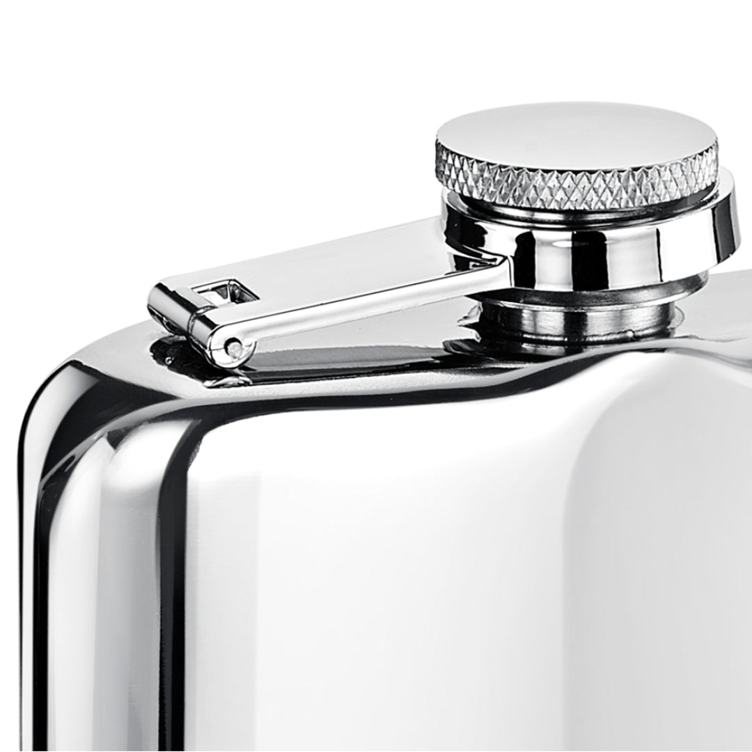 Close-up of a shiny metal flask with a cap on a white background