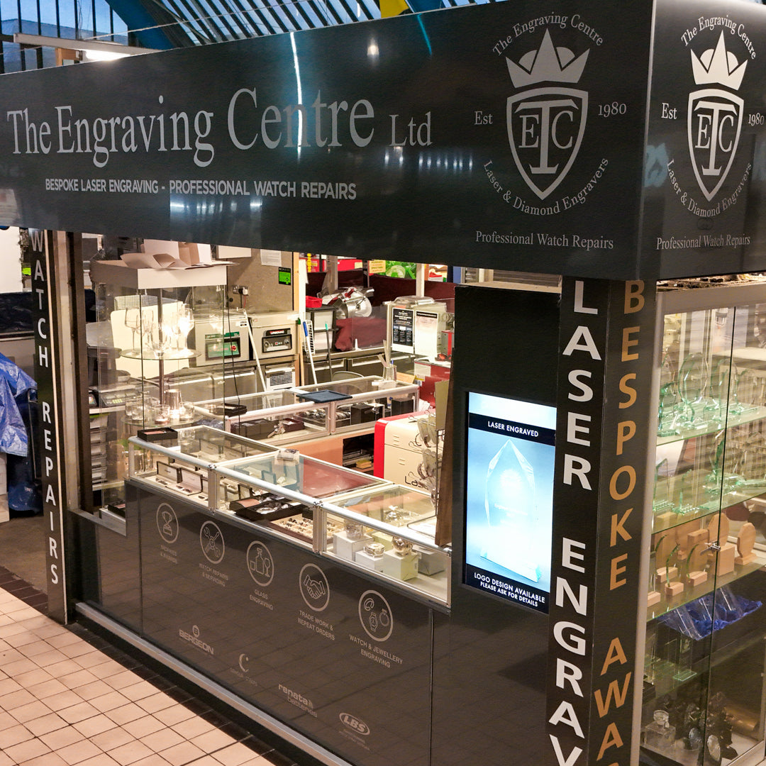 Storefront of The Engraving Centre Ltd with branding and product display.
